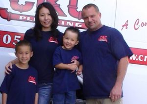 Owner of CRC Plumbing and his family